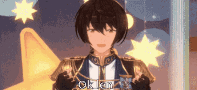 a boy in a suit is standing in front of a star .