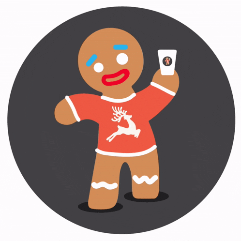 a gingerbread man wearing a red shirt with a reindeer on it
