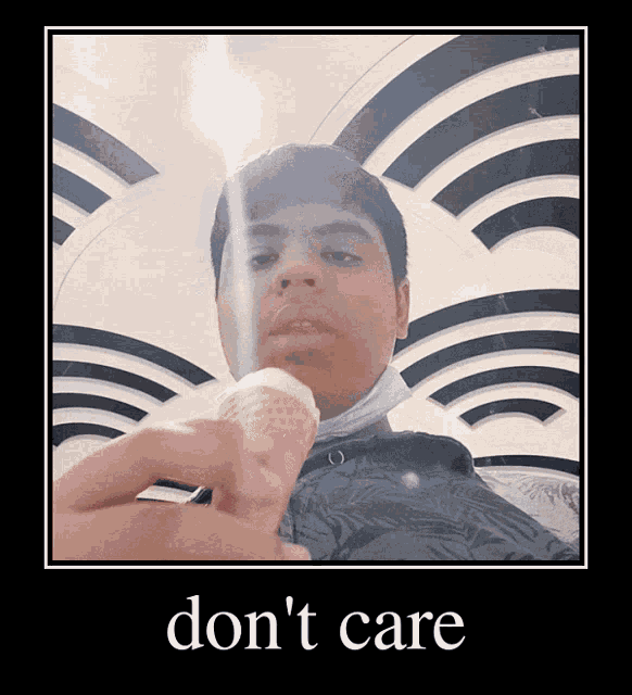 a picture of a man holding an ice cream cone with the words " don 't care " below him