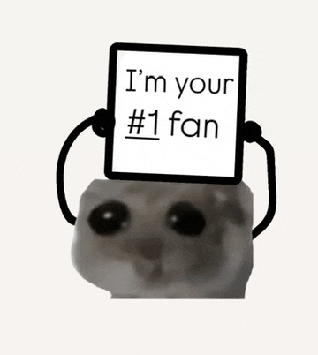 a cat is holding a sign that says i 'm your # 1 fan .