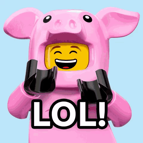 a lego figure is wearing a pink pig costume and holding a lol sign .
