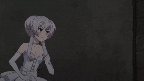 a girl in a white dress and white gloves holds out her hand