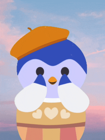 a penguin wearing an orange hat and a sweater with hearts