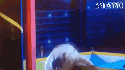 a pixelated image of a person laying on a bed with the words s figa toto written on the bottom