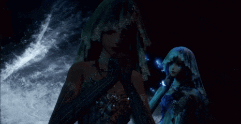 a woman in a veil is standing next to another woman