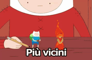 a cartoon character holding a pencil and the words più vicini