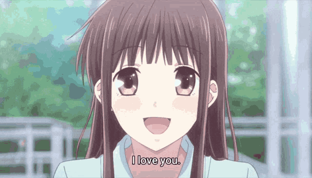 a girl with long hair is smiling and says i love you