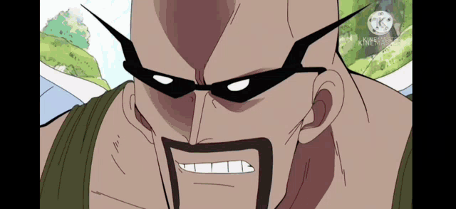 a cartoon character with a beard and glasses is smiling .