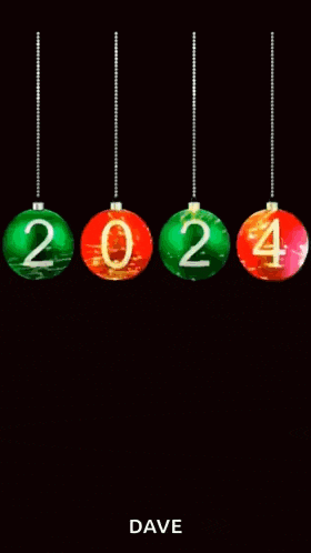 a happy new year greeting card with christmas balls hanging from strings