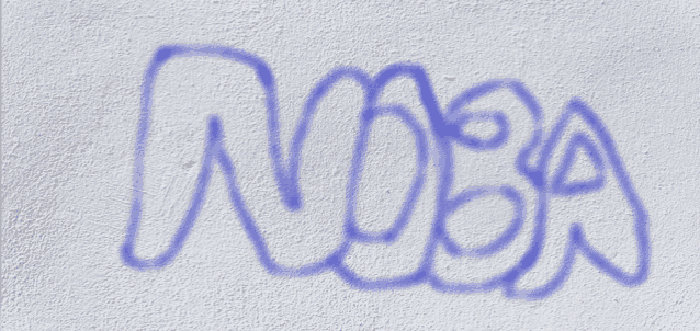 a white wall has the word roba spray painted on it