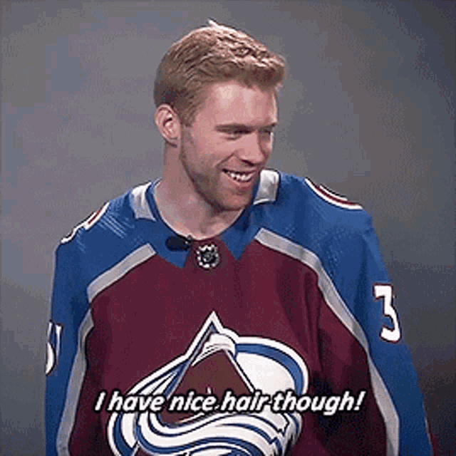 a hockey player with the number 3 on his jersey