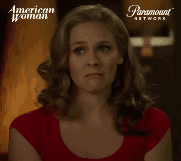 a woman 's face is shown in a paramount network ad for american woman