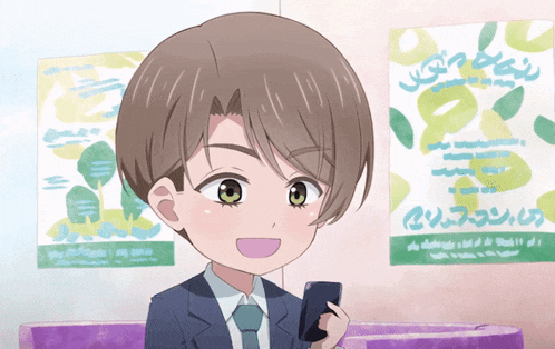 a man in a suit and tie is holding a cell phone in front of a poster that says ' tokyo '