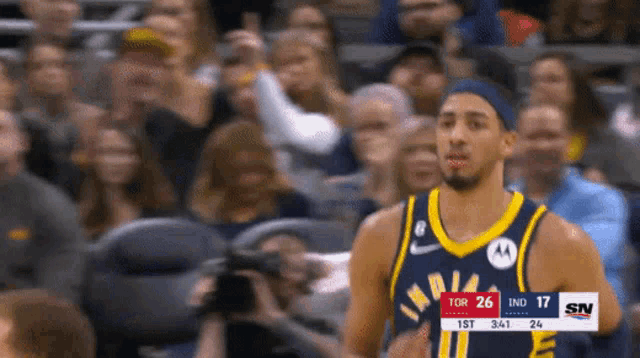 a basketball player wearing a jersey that says indiana