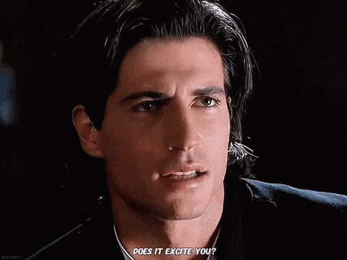 a close up of a man 's face with the words does it excite you