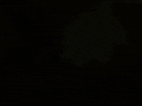 a dark blue background with a light coming out of it