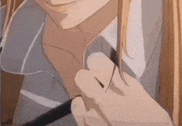 a close up of a person holding another person 's neck with a knife .