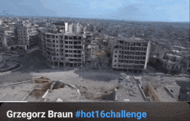 an aerial view of a city with the words grzegorz braun #hot16challenge