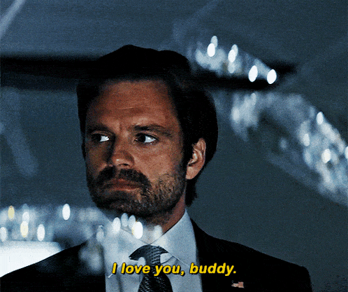 a man in a suit says " i love you buddy "