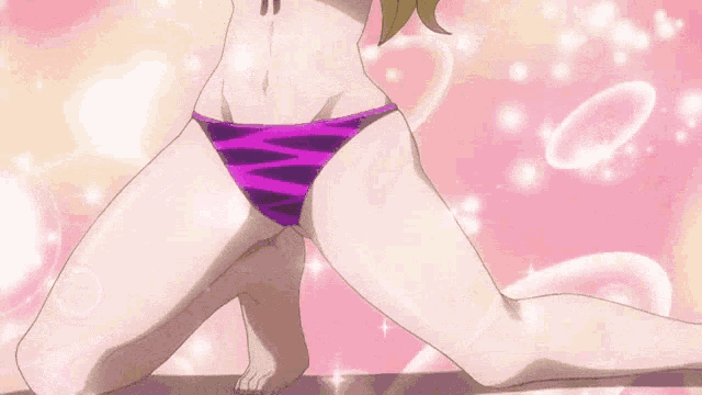 a woman in a bikini is surrounded by bubbles