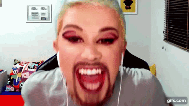 a woman with a fake beard is wearing headphones and making a face