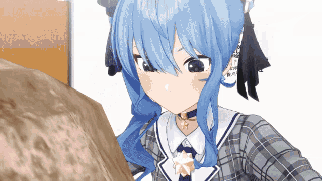 a girl with blue hair and a star on her chest is looking at something