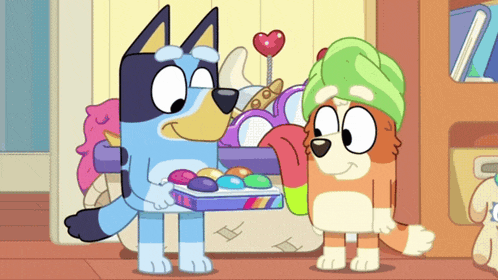 two cartoon characters are standing next to each other and one has a towel on her head