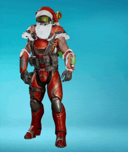 a man in a santa suit is standing on a blue surface
