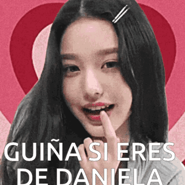 a girl with a finger in her mouth and the words guina si eres de daniela