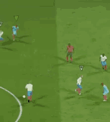 a group of soccer players are playing a game on a green field