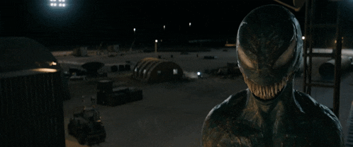 smoke is coming out of a tent in the middle of an airport