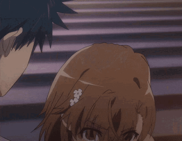 a man and a girl are looking at each other and the girl is making a funny face