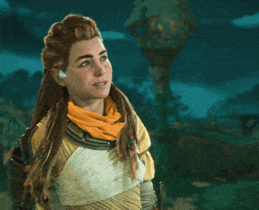 a woman with braided hair and a yellow scarf around her neck