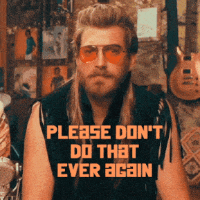 a man with a mullet and sunglasses says please don t do that ever again