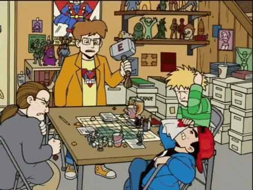 a man holding a hammer with the letter e on it is surrounded by other people