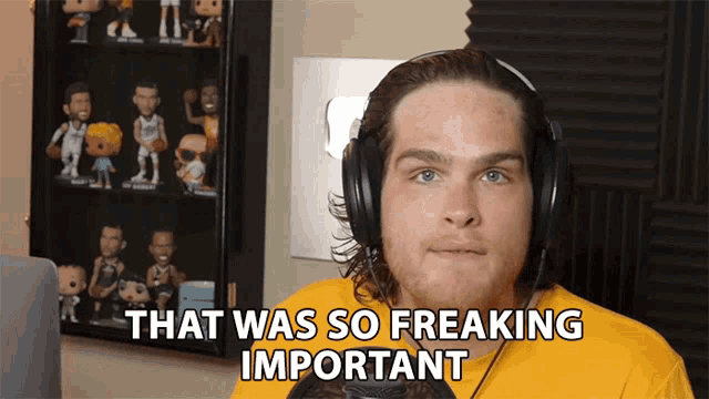 a man wearing headphones has the words that was so freaking important on his face