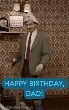 a man in a suit and tie is dancing in a living room .