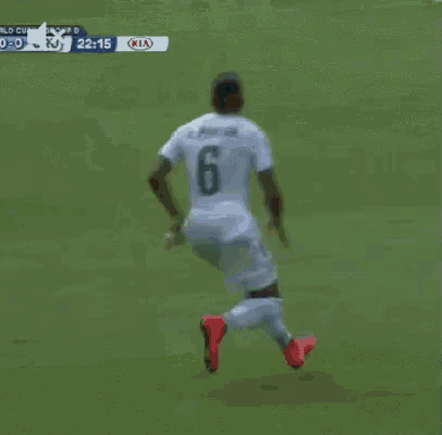 a soccer player with the number 6 on the back of his shirt