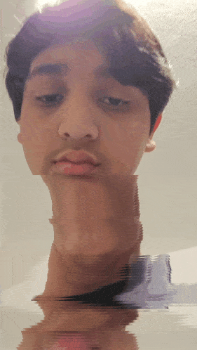 a close up of a person 's face with a long neck