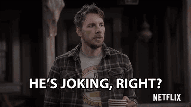 a man in a plaid shirt is holding a cup and says he 's joking right netflix