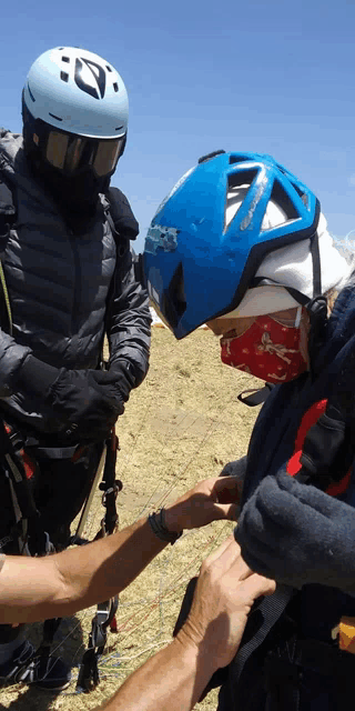 a person wearing a blue helmet with a letter y on it