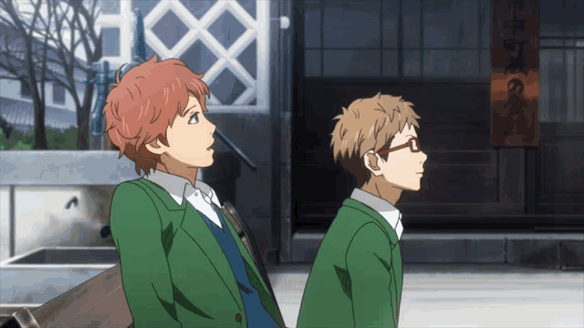 two anime characters standing in front of a building with chinese writing