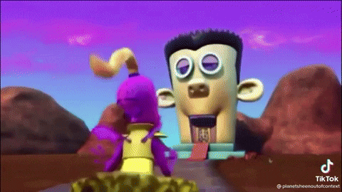 a cartoon character is standing next to another cartoon character in front of a building with a face on it .