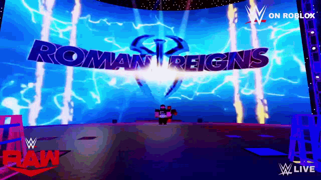 a large screen with roman reigns written in blue