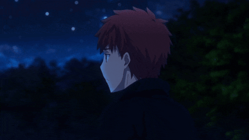 a boy and a girl are looking up at the stars