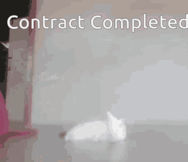 a sign that says contract completed in front of a pink blanket