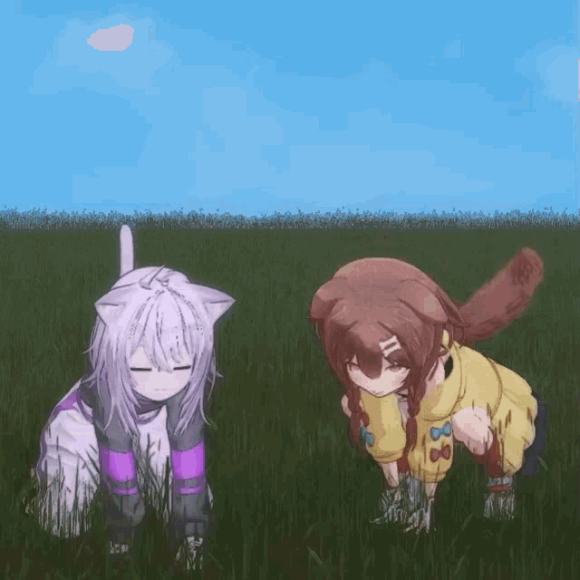 a cat and a girl are kneeling in a field of grass