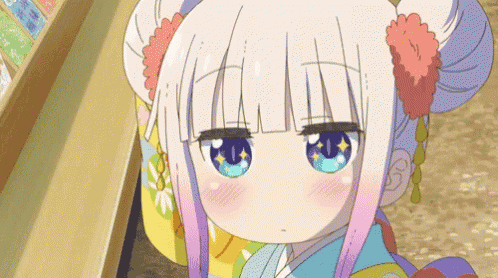 a girl with white hair and blue eyes is wearing a kimono and looking at the camera .