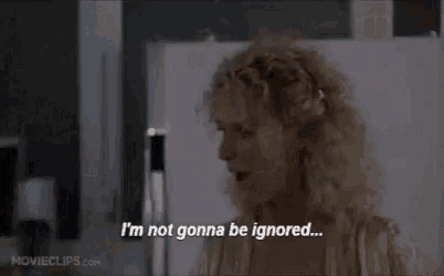 a woman is standing in front of a refrigerator in a kitchen and saying `` i 'm not gonna be ignored ... ''