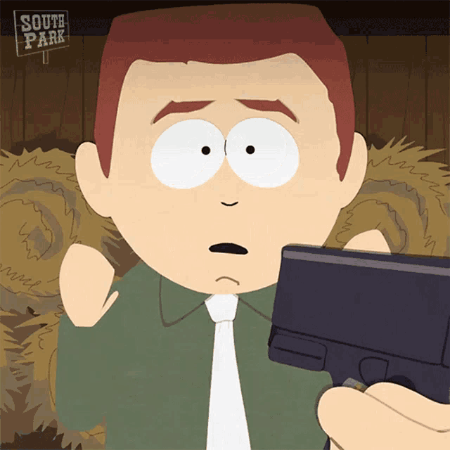 a cartoon character from south park is holding a gun in his hand